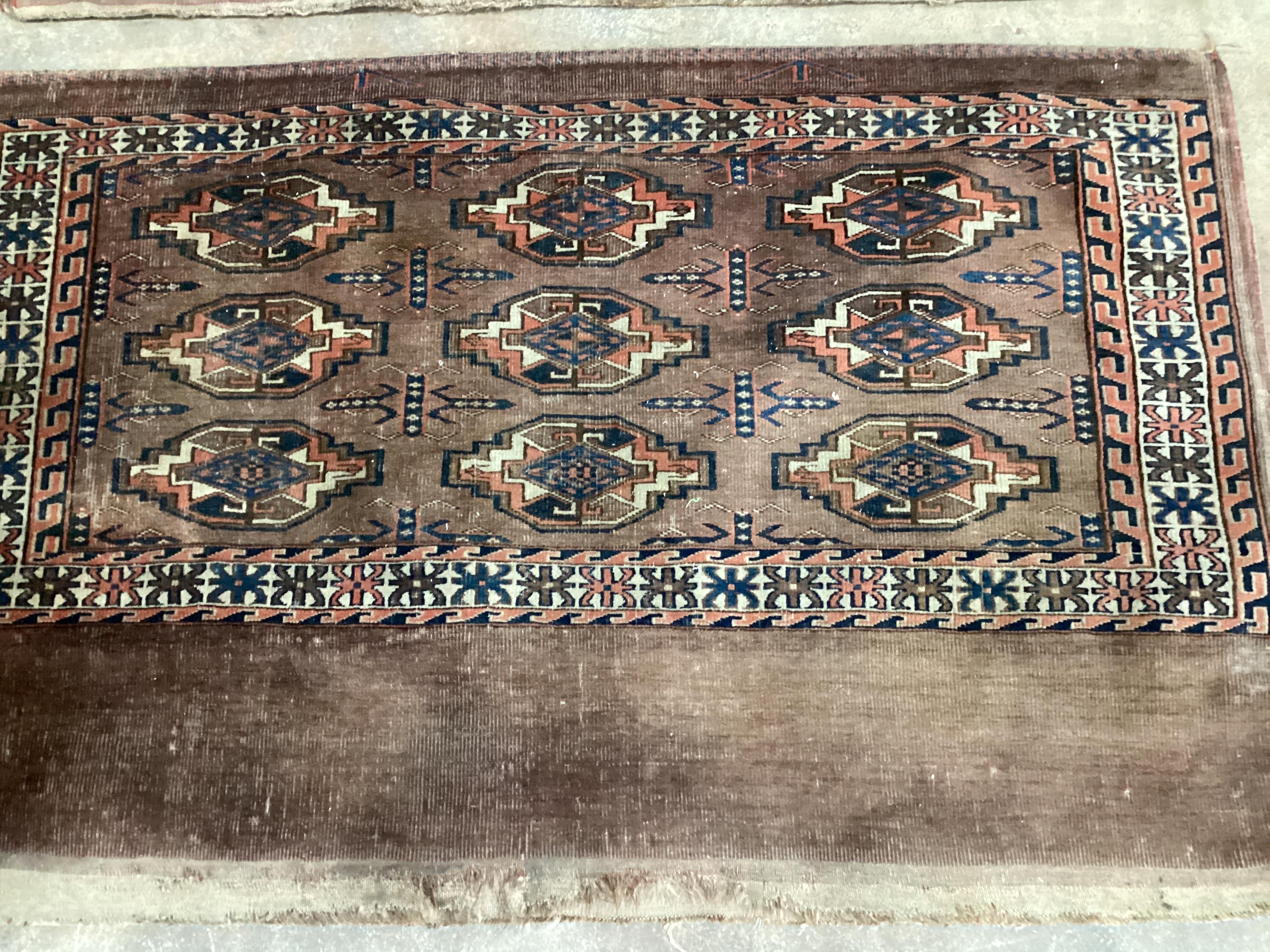 A pair of Antique Turkoman red ground bags, 118 x 76cm